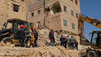Rescue teams search through the rubble of a collapsed four-storey residential building in Fez, Morocco, where at least nine people were killed and several others injured in an overnight disaster.
