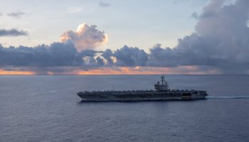 USS George H.W. Bush (CVN-77) operates alongside US naval and air forces enforcing maritime security operations and blockade measures near Iranian waters.